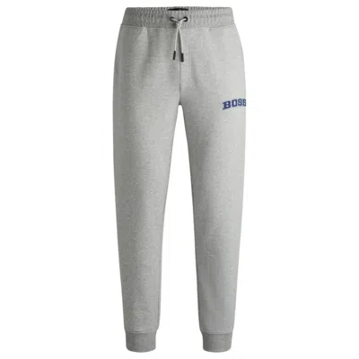 HUGO BOSS X NFL SIGNATURE-TAPE TRACKSUIT BOTTOMS WITH SPECIAL BRANDING