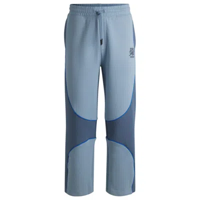 Hugo Boss X Rb Tracksuit Bottoms With Piping Details In Blue