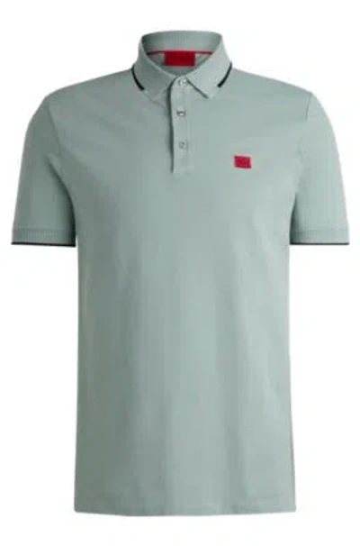 Hugo Boss Cotton-piqu Slim-fit Polo Shirt With Red Logo Label In Light Grey