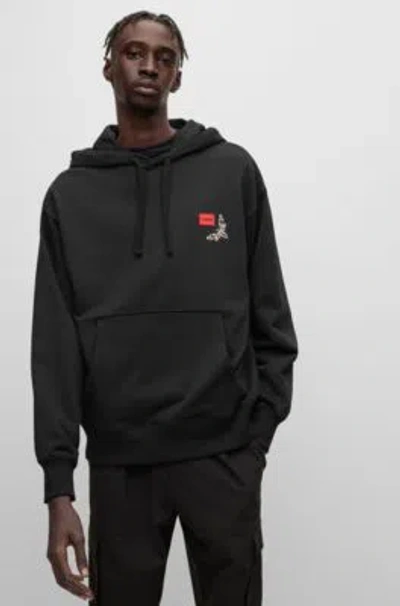 Hugo Cotton-terry Hoodie With Logo Label And Seasonal Artwork In Black