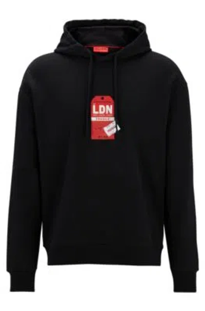 Hugo Boss Cotton-terry Hoodie With Travel-tag Artwork In Black