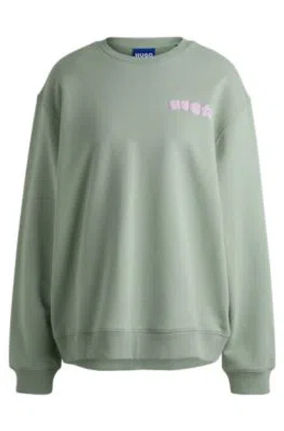 Hugo Cotton-terry Oversize-fit Sweatshirt With Seasonal Print In Green