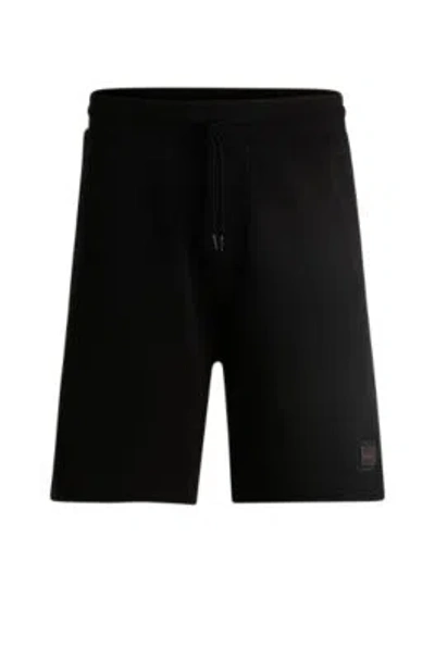 Hugo Boss Cotton-terry Relaxed-fit Shorts With Logo Trim In Black