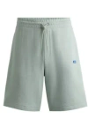 Hugo Cotton-terry Shorts With Blue Logo Patch In Light Green