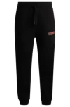 Hugo Cotton-terry Tracksuit Bottoms With Logo Print In Black