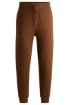 Hugo Boss Cotton-terry Tracksuit Bottoms With Logo Print In Brown