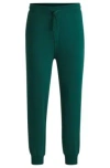 Hugo Boss Cotton-terry Tracksuit Bottoms With Logo Print In Dark Green
