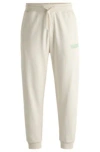 Hugo Boss Cotton-terry Tracksuit Bottoms With Logo Print In White