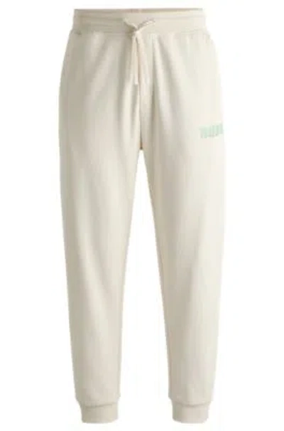 Hugo Cotton-terry Tracksuit Bottoms With Logo Print In Neutral