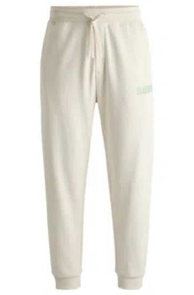 Hugo Boss Cotton-terry Tracksuit Bottoms With Logo Print In White