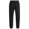 Hugo Boss Cotton-terry Tracksuit Bottoms With Smiley-face Logo Patch In Black