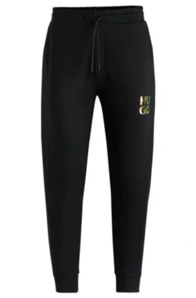 Hugo Boss Cotton-terry Tracksuit Bottoms With Stacked Logo In Black