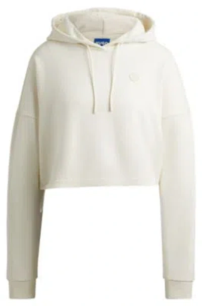 Hugo Boss Cropped Cotton-terry Hoodie With Happy Hugo Logo Badge In White