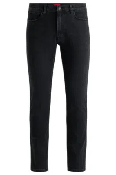 HUGO BOSS EXTRA-SLIM-FIT JEANS IN BLACK SOFT-TOUCH DENIM