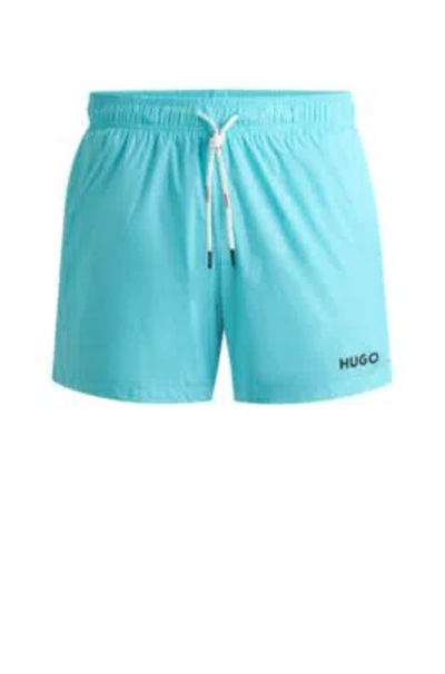 Hugo Boss Fully Lined Swim Shorts With Logo Print In Turquoise
