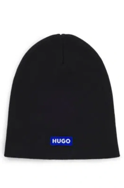 Hugo Boss Knitted-cotton Beanie Hat With Blue Logo Label In Black