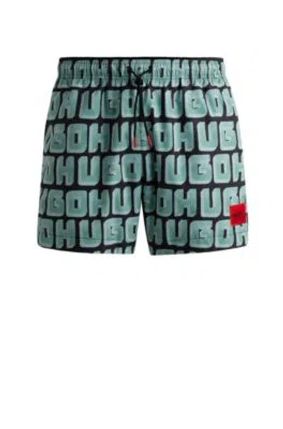 Hugo Boss Quick-dry Swim Shorts With All-over Logo Print In Light Green