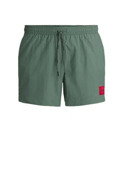 Hugo Boss Quick-dry Swim Shorts With Logo Label In Green