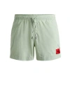 Hugo Boss Quick-dry Swim Shorts With Red Logo Label In Gold