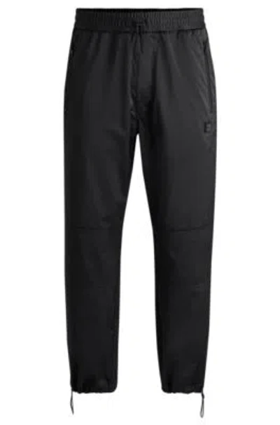 Hugo Boss Regular-fit Trousers In Water-repellent Satin In Black