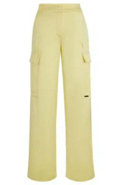 Hugo Relaxed-fit Cargo Trousers In Satin In Light Yellow