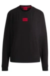 Hugo Boss Relaxed-fit Sweatshirt In Terry With Red Logo Label In Black