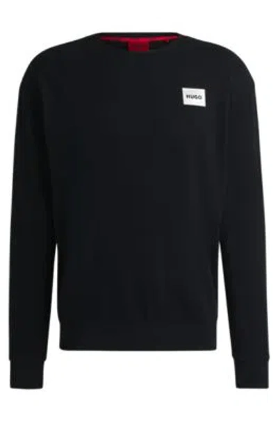 Hugo Boss Relaxed-fit Sweatshirt With Metallic Logo Label In Black