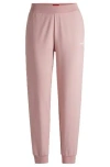 Hugo Boss Relaxed-fit Tracksuit Bottoms With Printed Logo In Pink