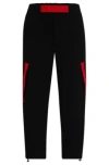 Hugo Boss Relaxed-fit Tracksuit Bottoms With Red Logo Tape In Black