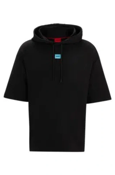 Hugo Short-sleeved Relaxed-fit Hoodie In Cotton Terry In Black