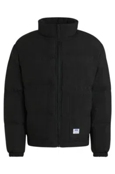 Hugo Boss Slim-fit Water-repellent Puffer Jacket With Logo Label In Black