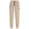 Hugo Boss Stretch-cotton Tracksuit Bottoms With Stacked Logo In Beige