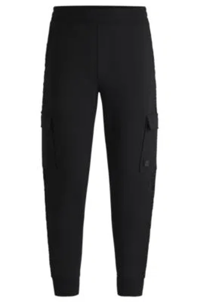 Hugo Boss Stretch-cotton Tracksuit Bottoms With Stacked Logo In Black