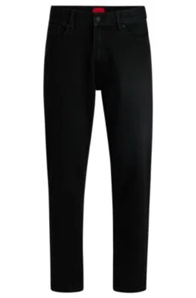 HUGO BOSS TAPERED-FIT JEANS IN BLACK DENIM