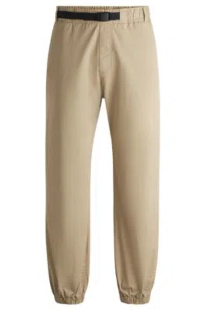 Hugo Boss Tapered-fit Trousers In Stretch Gabardine With Branded Belt In Beige