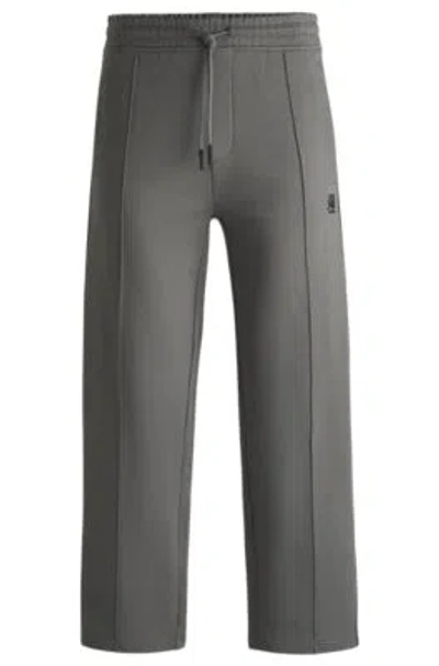 Hugo Boss Hugo X Rb Cotton-terry Tracksuit Bottoms With Logo Tape In Light Grey