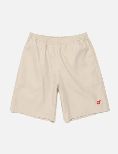 Human Made Beach Shorts In Sand