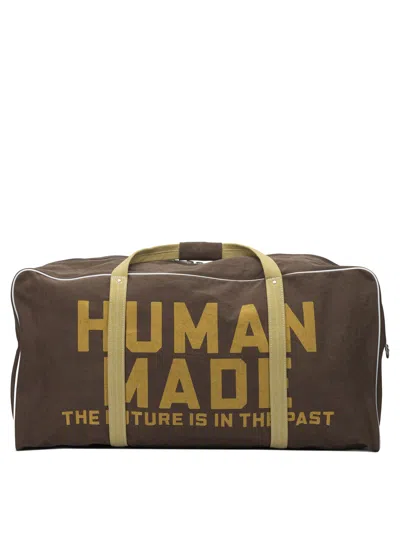 HUMAN MADE HUMAN MADE BROWN COTTON SPORT BAG