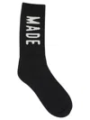 Human Made Stylish Crew Socks With Bold Text Design In Black