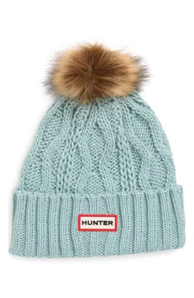Hunter Logo Cable Knit Faux Fur Pompom Fleece Lined Beanie In Blue