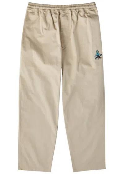 Ice Cream Skate Tapered-leg Cotton Trousers In Beige