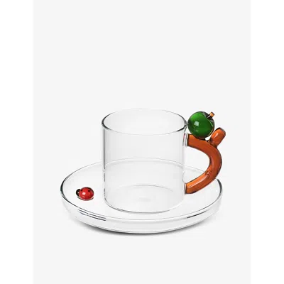 Ichendorf Apple And Ladybug Borosilicate-glass Tea Cup With Saucer In Transparent