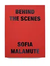 Idea Sofia Malamute Behind Book In Red