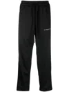 Ih Nom Uh Nit Logo-embellished Side Panels Track Pants In Black