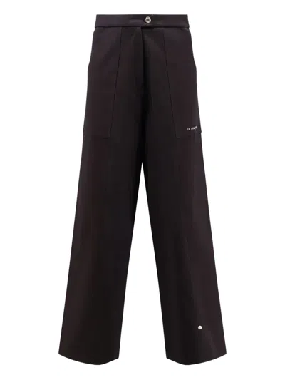 Ih Nom Uh Nit Logo-print Trousers In Black