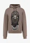 Ih Nom Uh Nit Hooded Sweatshirt Featuring Graphic Print In Brown