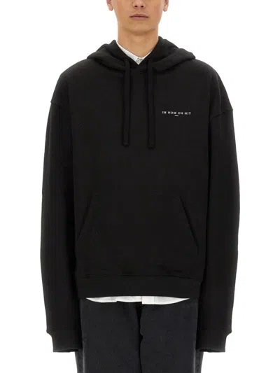 IH NOM UH NIT RELAXED FIT BLACK HOODIE WITH GRAPHIC DESIGN
