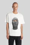 Ih Nom Uh Nit Graphic Print Crew Neck Short Sleeve T-shirt In Brown