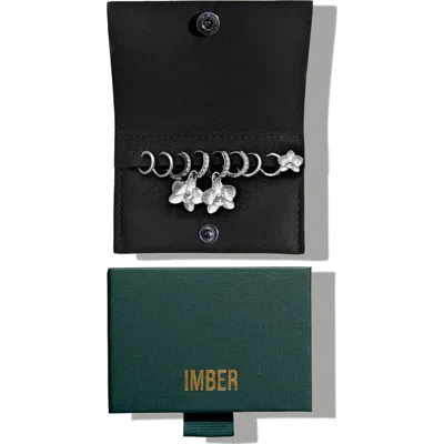 Imber Set Of 9 Orchid Hoop, Stud & Drop Earrings In Black