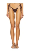 Indah Reba Skimpy Solid Studded Side Ties Bikini Bottom In Brown